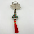 Llavero Artesanal Tibetano Concha
